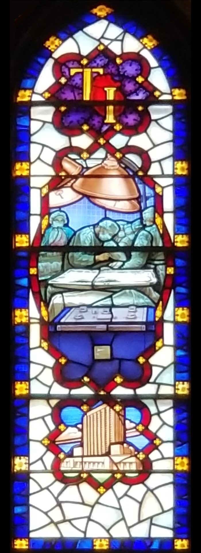 stained glass window showing Dr Cooley in surgery